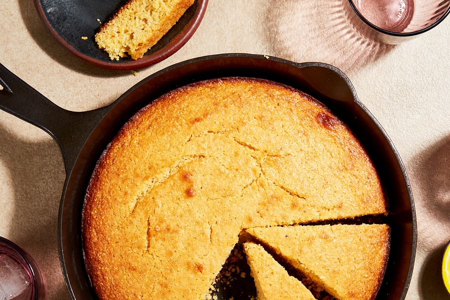 golden cornbread in cast iron skillet