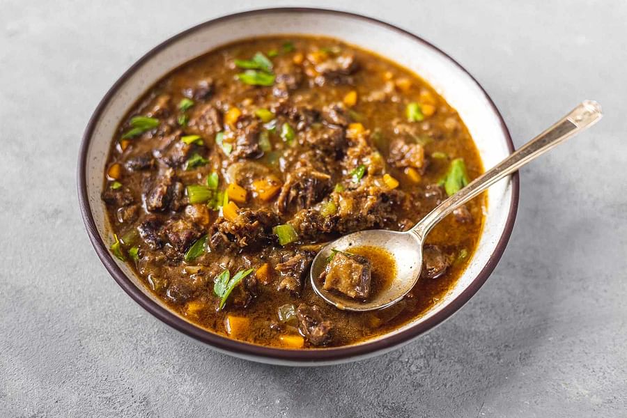 Steaming hot bowl of Southern oxtail soup